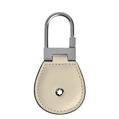Crema portachiavi meisterstück in pelle liscia beige nuvolato con moschettone metallico argentato e logo montblanc