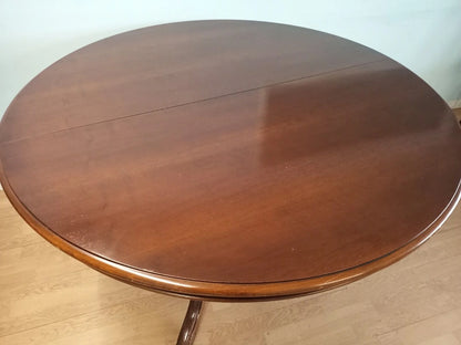 Tavolo tondo allungabile stile luigi filippo in legno di mogano lucido ideale per casa vintage anni 1970 circa