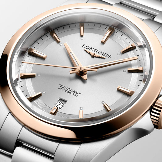 Longines Conquest 30mm automatisk silver roséguld stålklocka L3.320.5.72.6